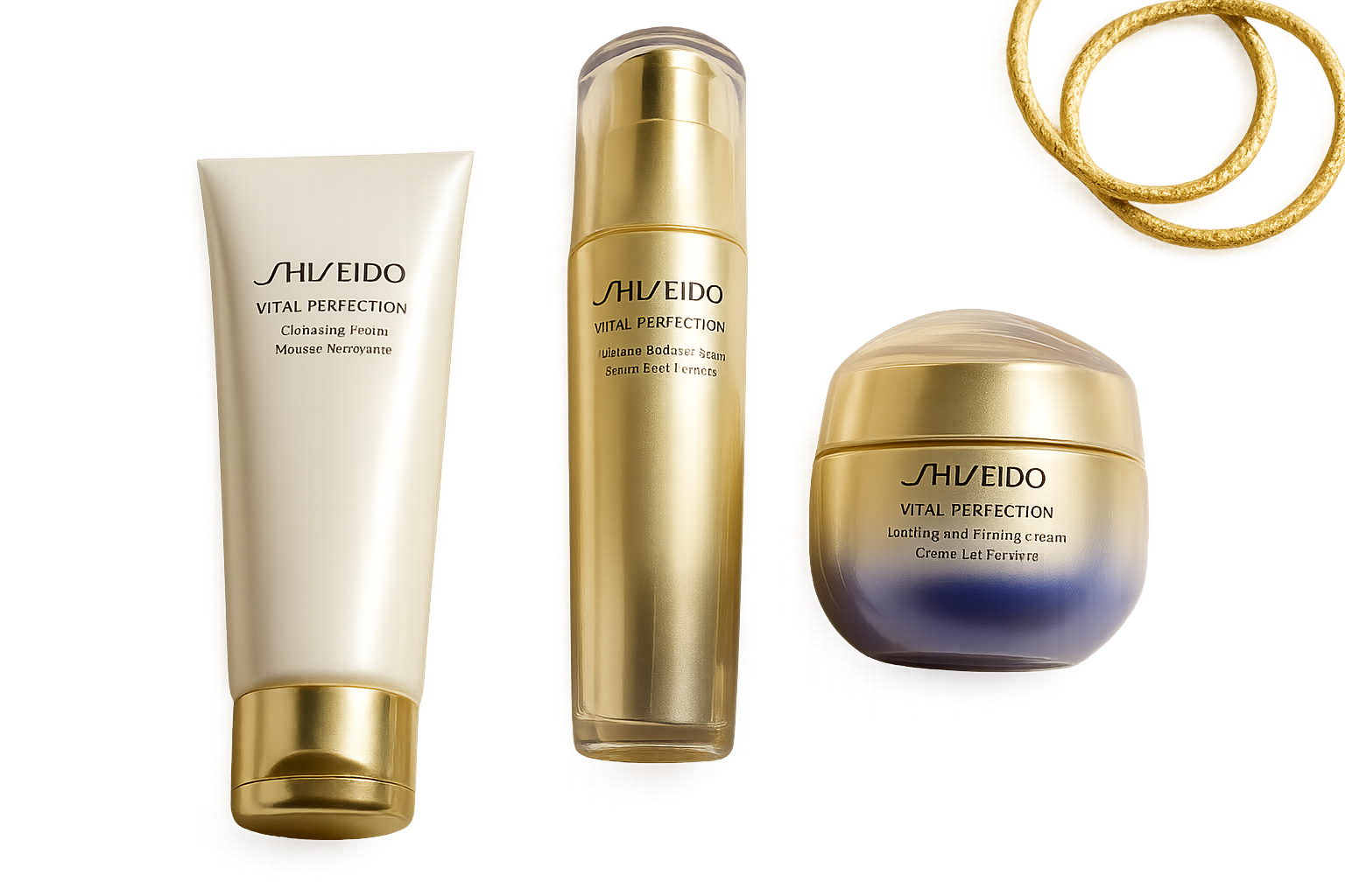 Close-up of elegant Shiseido Vital Perfection skincare products arranged on a reflective surface with soft natural light, highlighting textures and subtle gold accents