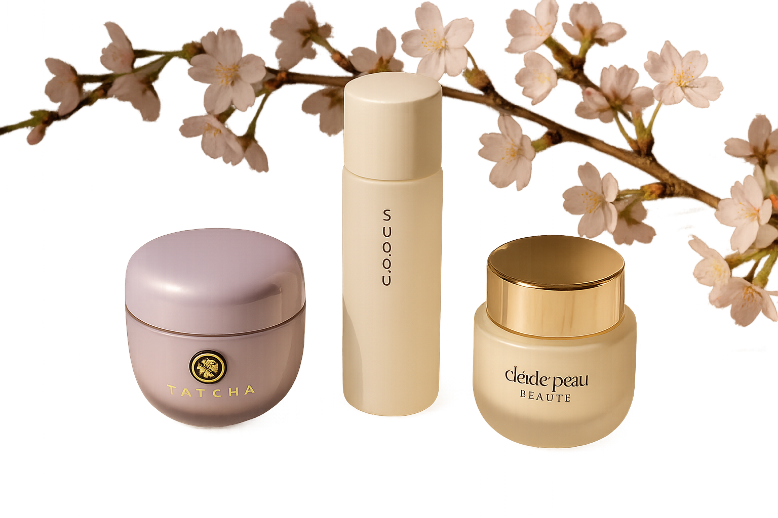 Elegant display of Japanese luxury skincare products including Tatcha, Suqqu, and Clé de Peau Beauté on a clean marble surface with soft natural daylight